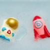 imageMunchkin Galaxy Buddies Water Safe Light Up Baby and Toddler Bath Toy Astronaut ampamp Rocket ShipSmall